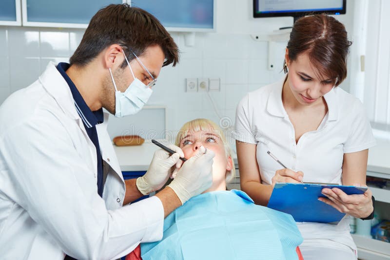 Dental Assistant during Apprenticeship Taking Notes Stock Image Image