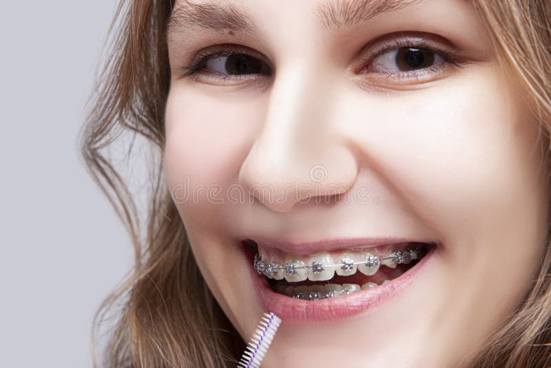 Dental Concepts. Portrait of Teenage Girl Using Bristle Brush for