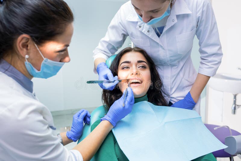 Dental Doctors Examining Patient. Stock Photo Image of diagnosis