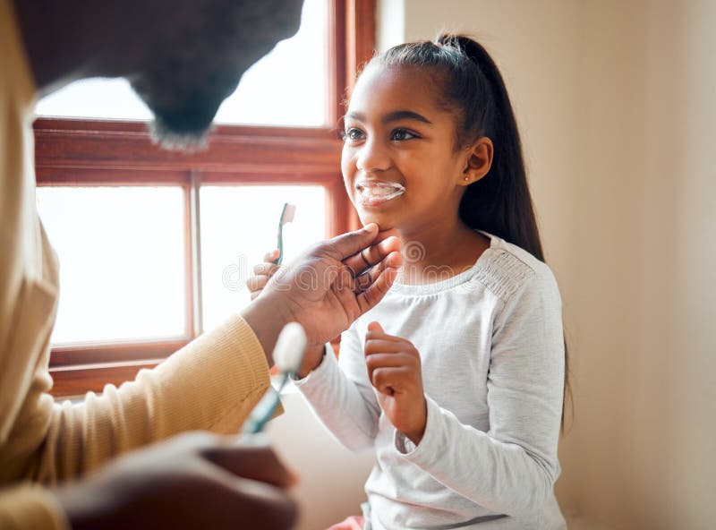 Dental Health Father And Daughter Brushing Teeth In A Bathroom For Hygiene Grooming And 