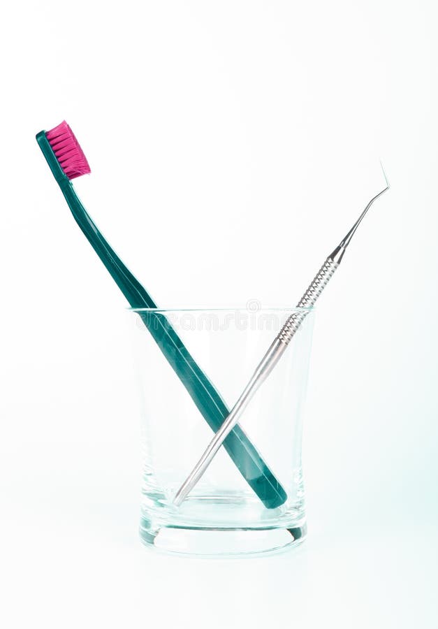 Dental Instrument and Tooth Brush in Glass Stock Photo Image of