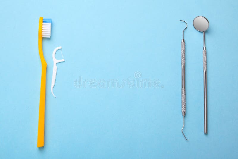 Dental Instruments. Dental Mirror, Probe Hook and Toothbrush with Floss