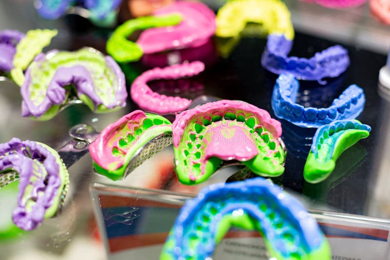 Dental Orthodontic Tools. Multicolored Device for Making a Molded