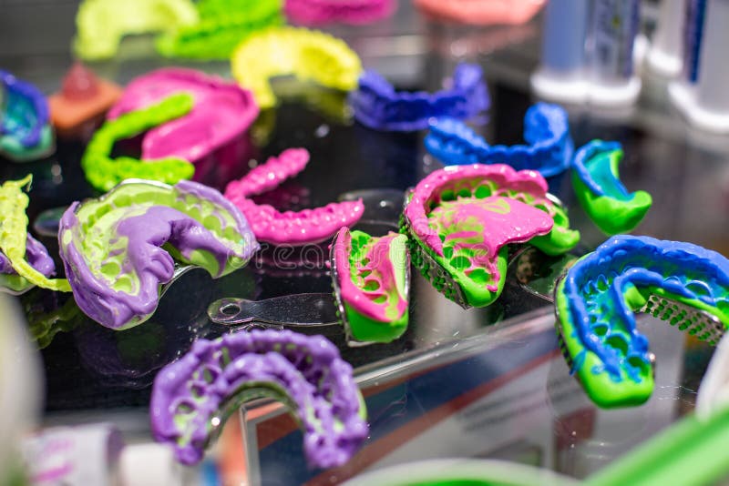 Dental Orthodontic Tools. Multicolored Device for Making a Molded