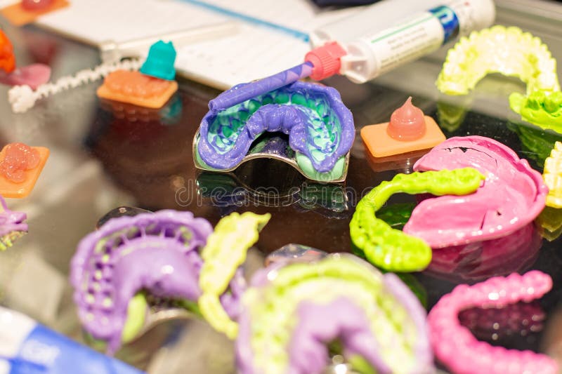 Dental Orthodontic Tools. Multicolored Device for Making a Molded