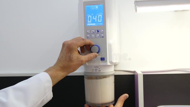 Dental Technician kneads the plaster solution stock video footage