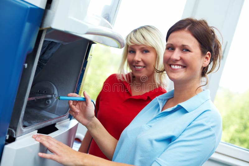 Dental Technicians on a CADCAM Stock Image Image of modern, drill