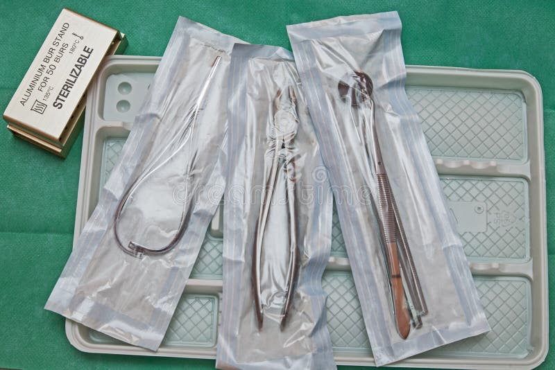 Steril dentist tools on a plastic plate