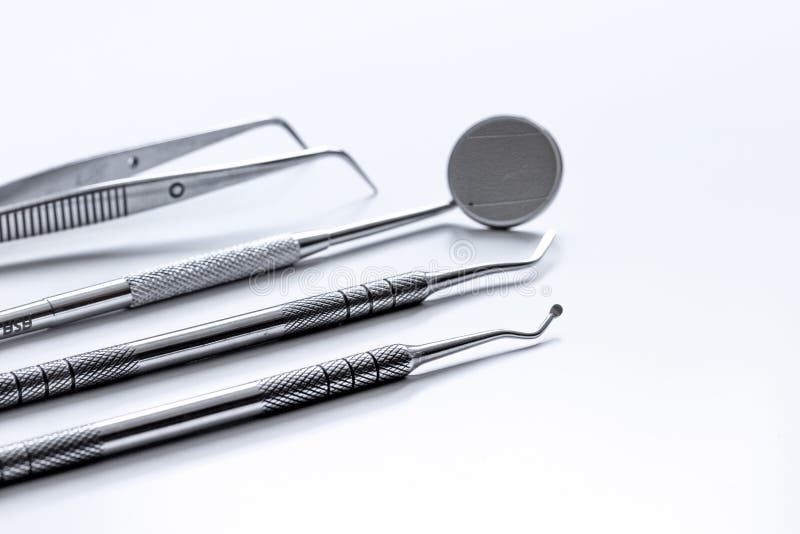Dental Tools on White Background Close Up Stock Image Image of steel