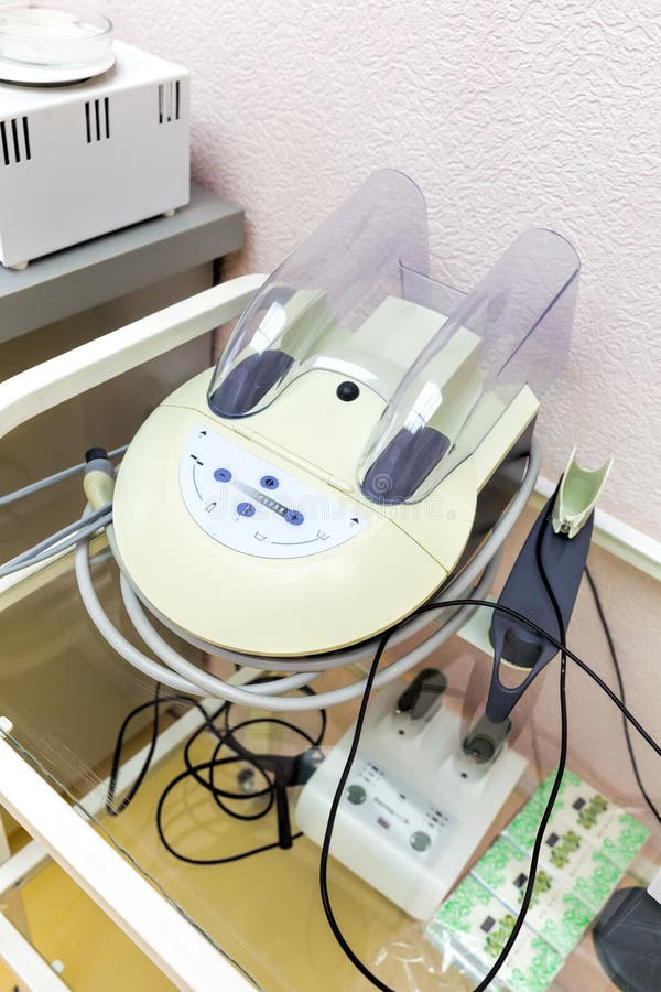 Ultrasonic Scaler in the Dental Office. Dentistry Concept Stock Image