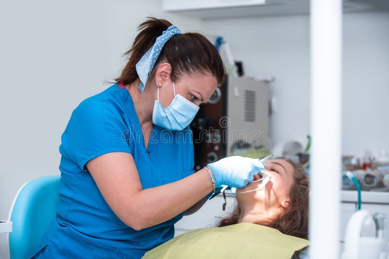 Dentist Appointment at a Dental Clinic, Placing Braces Locks on the