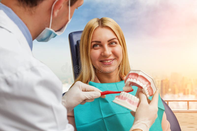 Dentist Cleaning Artificial Jaw Stock Photo Image of oral, dentist 76709568