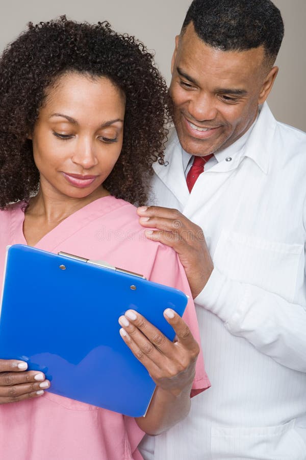 Dentist and dental nurse stock images