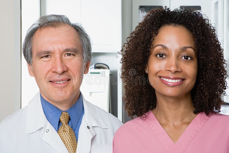 Dentist and dental nurse royalty free stock photos