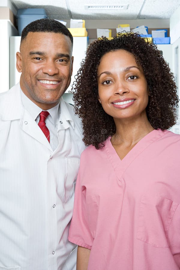 Dentist and dental nurse royalty free stock photo