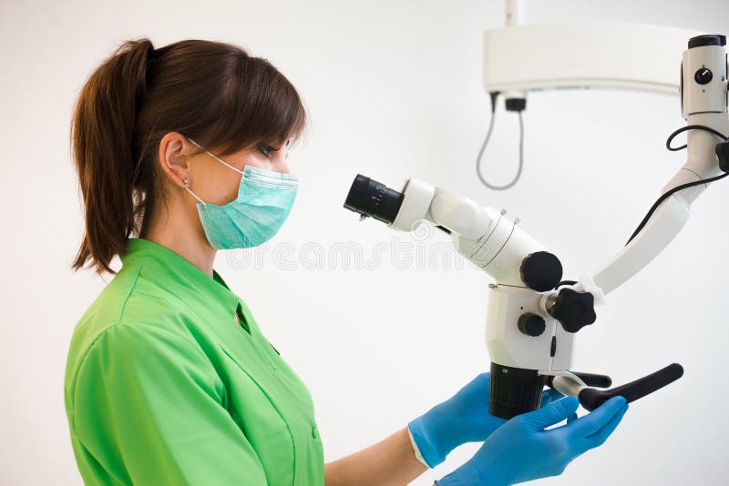 Dentist Doctor Using Dental Microscope. Stock Image Image of