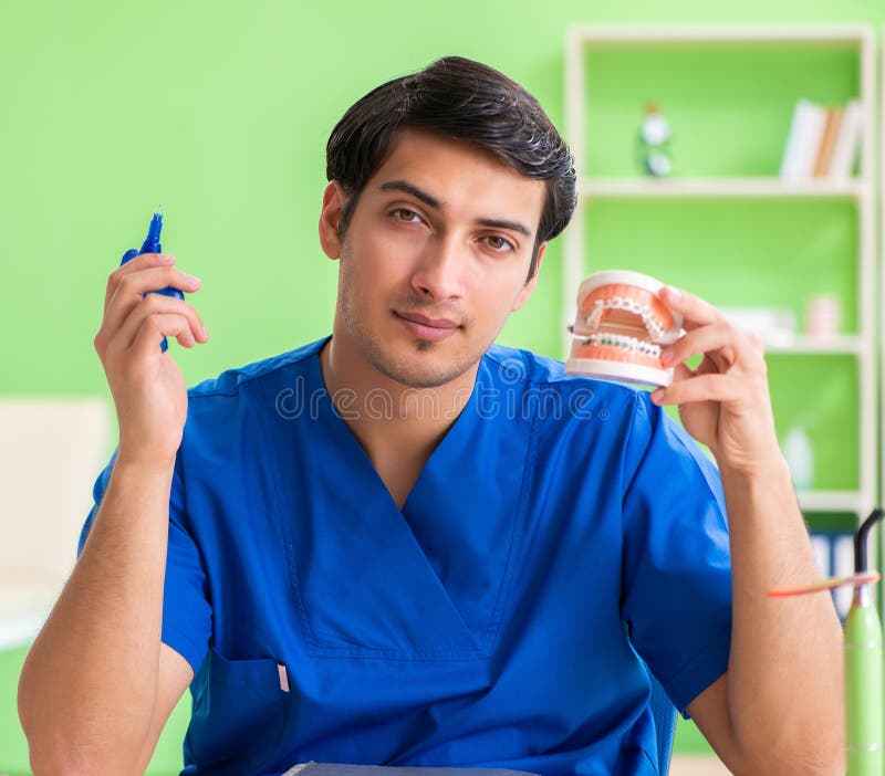 Dentist Doctor Working on New Tooth Implant Stock Photo Image of molar, brackets 215185740