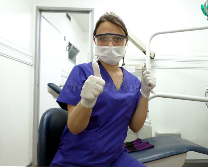 Dentist with Gloves, Mask, Mirror and Explorer Stock Image Image of