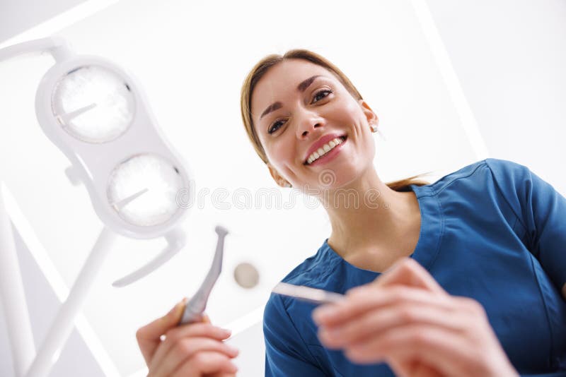 Dentist Holding Dental Drill Fixing Tooth Stock Photo Image