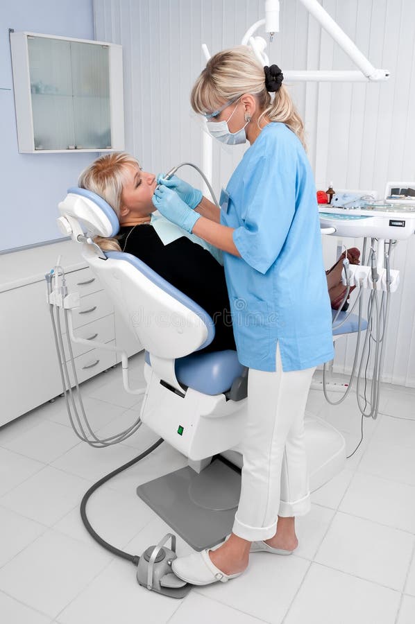 A Dentist S Office with a Chairs and Other Medical Equipment. AI