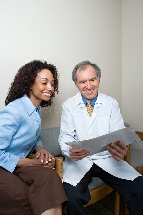 Dentist with patient stock images