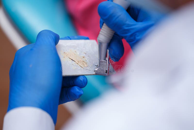 Dentist Prepares Solution for Seals Stock Image Image of hygiene
