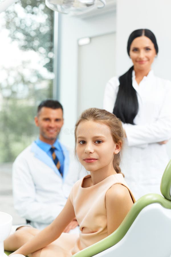 Dentist Doctor Looking at X-ray at the Hospital. Stock Photo - Image of