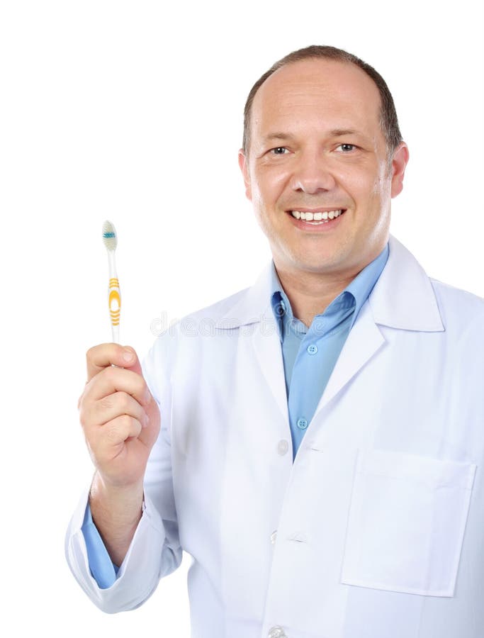 Dentist with toothbrush