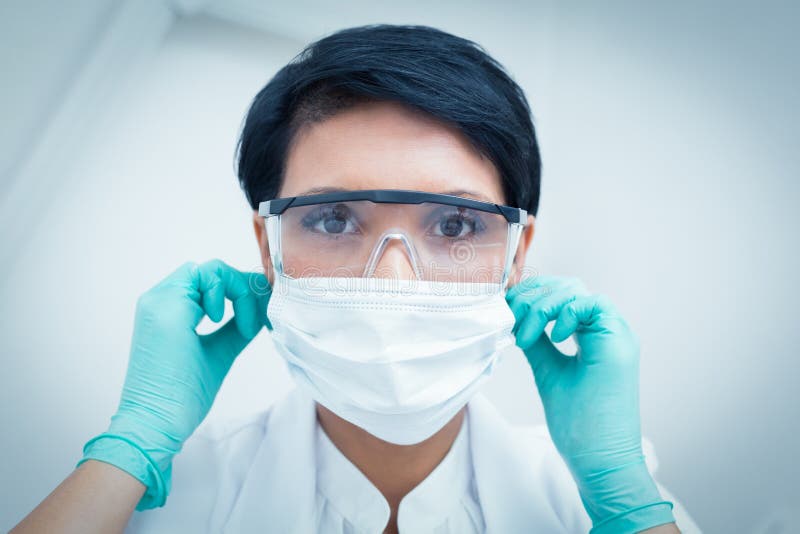 Dentist Wearing Surgical Mask and Safety Glasses Stock Image Image of