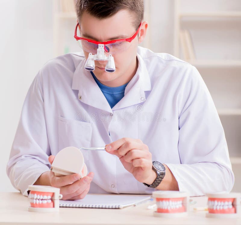 Dentist Working Teeth Implant in Medical Lab Stock Image Image of