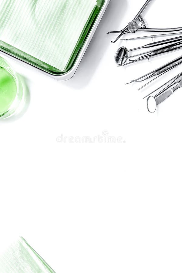 Dentist Tools Close Up on White Hospital Desk Background Stock