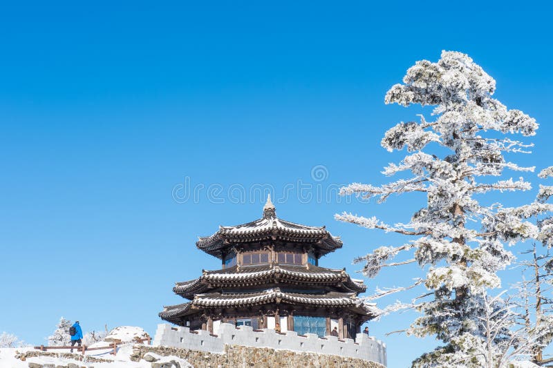 DEOGYUSAN,KOREA - JANUARY 23: Tourists taking photos of the beautiful scenery around Deogyusan,South Korea on January 23, 2015. DEOGYUSAN,KOREA - JANUARY 23: Tourists taking photos of the beautiful scenery around Deogyusan,South Korea on January 23, 2015.