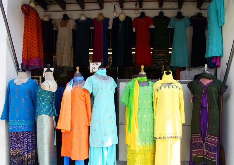 A shop at Little India, Singapore. The heritage district of the Indian early migrants, now preserved for its history and rich local colour. Shop selling colourful and bright desses, blouses and suits for ladies. A shop at Little India, Singapore. The heritage district of the Indian early migrants, now preserved for its history and rich local colour. Shop selling colourful and bright desses, blouses and suits for ladies.