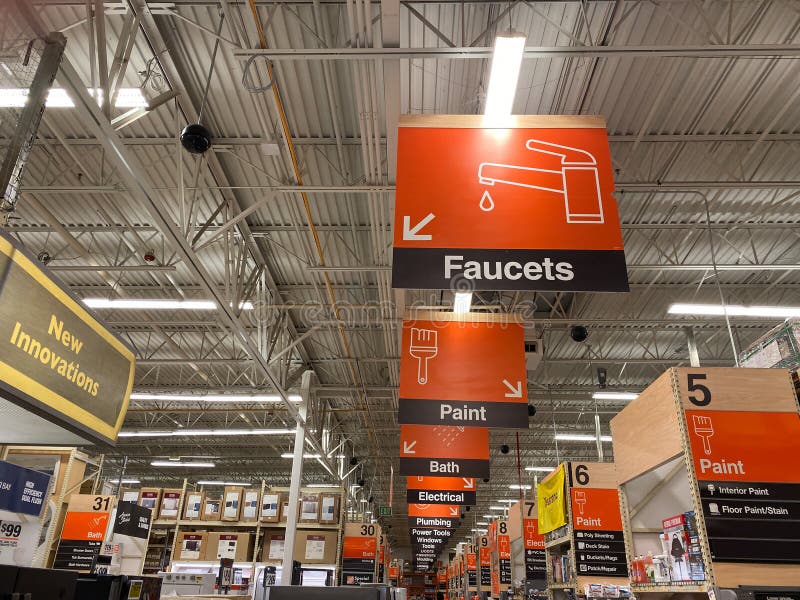 The Department Signs Hanging From The Ceiling At Home Depot Home