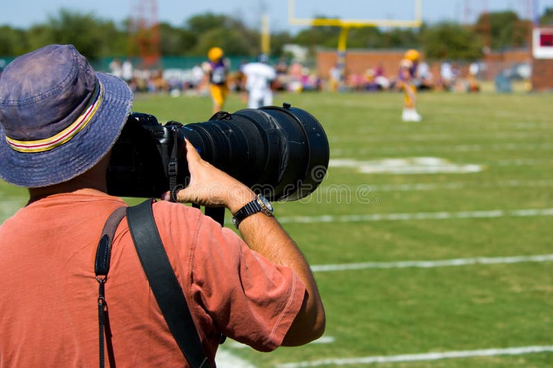 Deportes profesionales Photogapher - fútbol americano imagen de archivo libre de regalías
