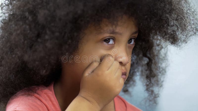 Portrait of an african man with Down syndrome is in an African