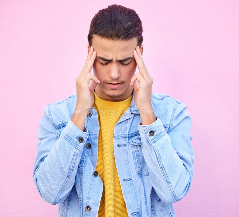 Depression, Stress and Man with Headache in Studio Isolated on a Pink
