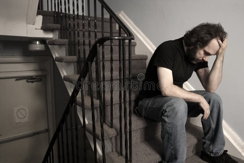 Depressione in modo schiacciante fotografia stock libera da diritti Depressione in modo schiacciante fotografia stock libera da diritti