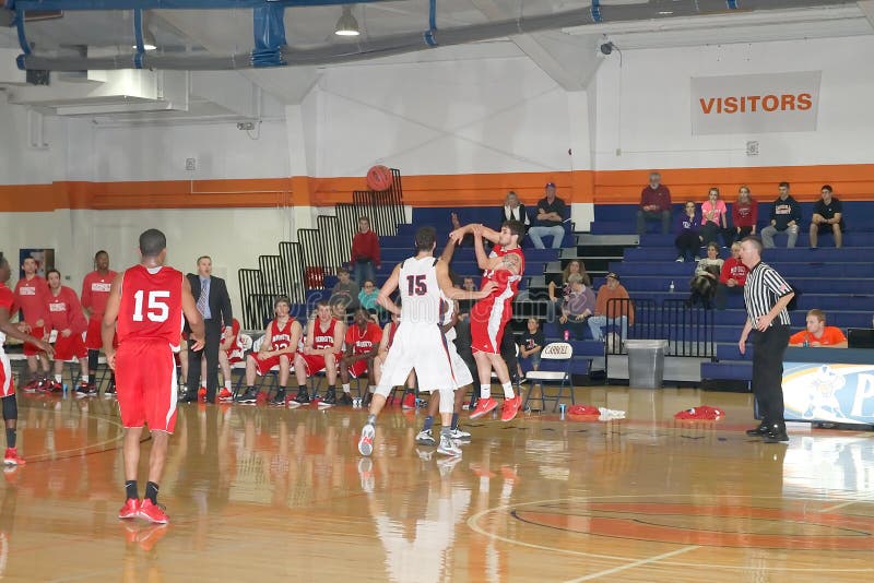 Carroll University, Waukesha, WI, USA, Dec 6, 2014. A Menâ€™s NCAA Conference Midwest DIV III basketball game between Carroll University and Monmouth College. Carroll lost 65-57. Photos were taken Dec 6, 2014. Monmouth #32, Marema, a forward is in trouble. He passes to another player. Carroll University, Waukesha, WI, USA, Dec 6, 2014. A Menâ€™s NCAA Conference Midwest DIV III basketball game between Carroll University and Monmouth College. Carroll lost 65-57. Photos were taken Dec 6, 2014. Monmouth #32, Marema, a forward is in trouble. He passes to another player.