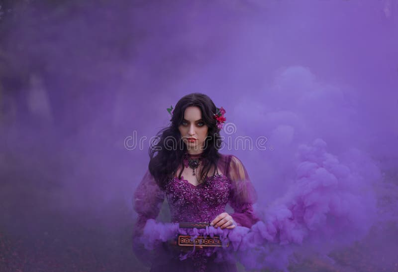 Pandora`s box The treacherous brunette girl in a luxurious dress is holding an open casket in her hands, from which the evils of humanity fly out. Violet smoke with beautiful clouds fills the background. Art photo. Pandora`s box The treacherous brunette girl in a luxurious dress is holding an open casket in her hands, from which the evils of humanity fly out. Violet smoke with beautiful clouds fills the background. Art photo.