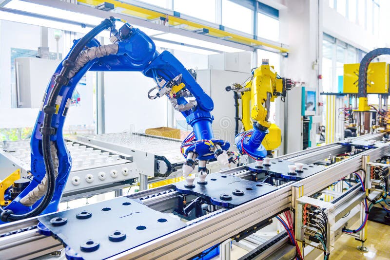 In der Fabrikwerkstatt Roboterarmroboterhandroboter-Fließband lizenzfreie stockfotos