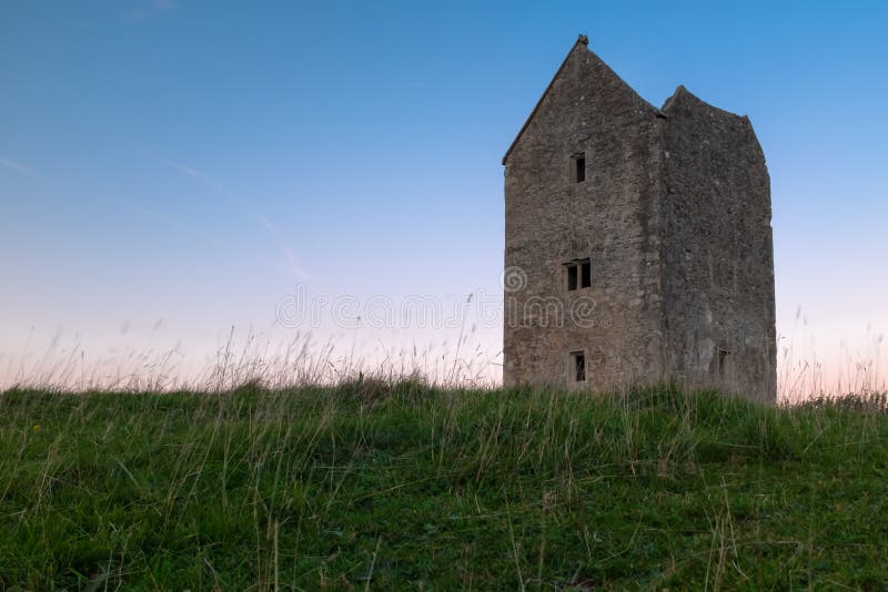 Der Grad II aufgeführte Taubenschlag-Turm bei Bruton in Somerset schoss bei Sonnenuntergang lizenzfreie stockfotografie Der Grad II aufgeführte Taubenschlag-Turm bei Bruton in Somerset schoss bei Sonnenuntergang lizenzfreie stockfotografie