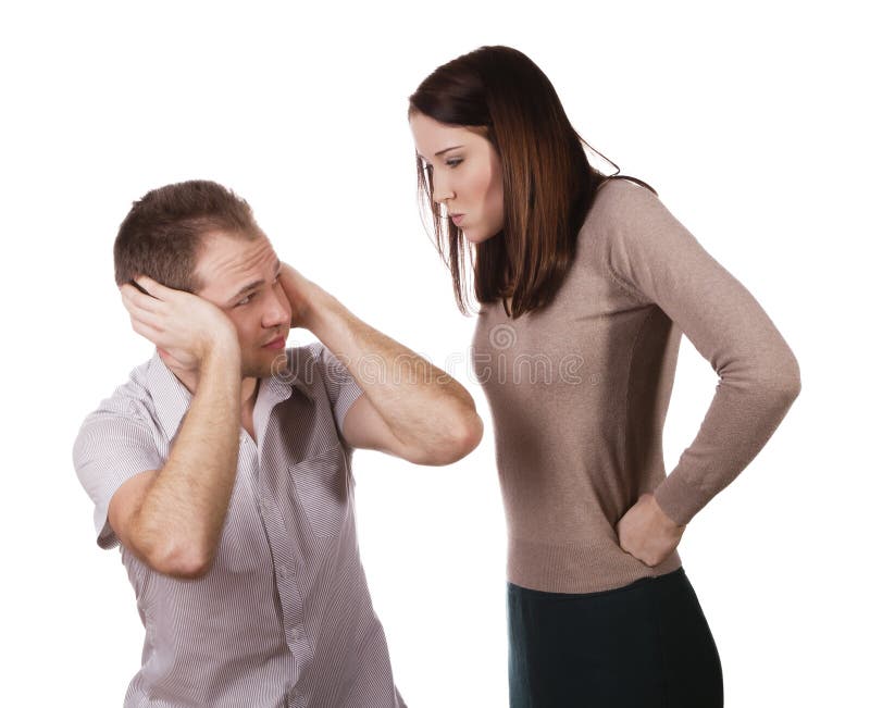 Man shutting his ears and not listening to the persistent yelling of his spouse. Man shutting his ears and not listening to the persistent yelling of his spouse