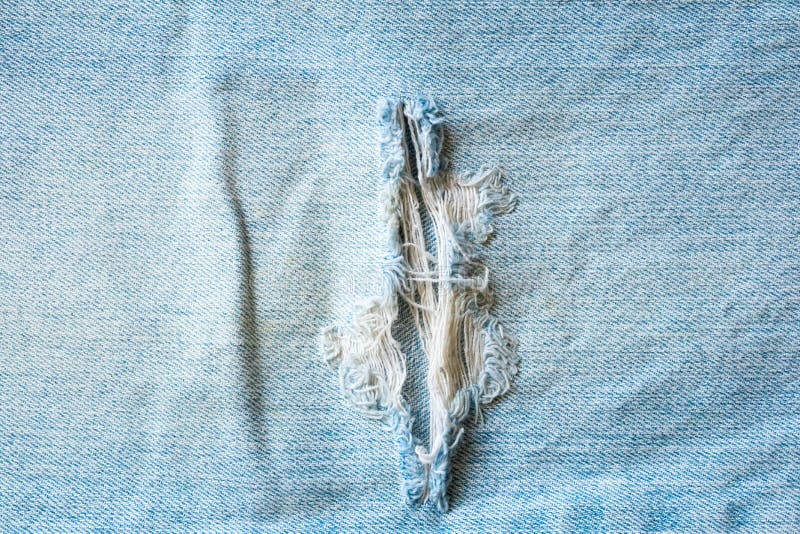 Der Modeentwurfsbeschaffenheitshintergrundes des Denims Blue Jeans gewalttätige Draufsicht lizenzfreie stockbilder