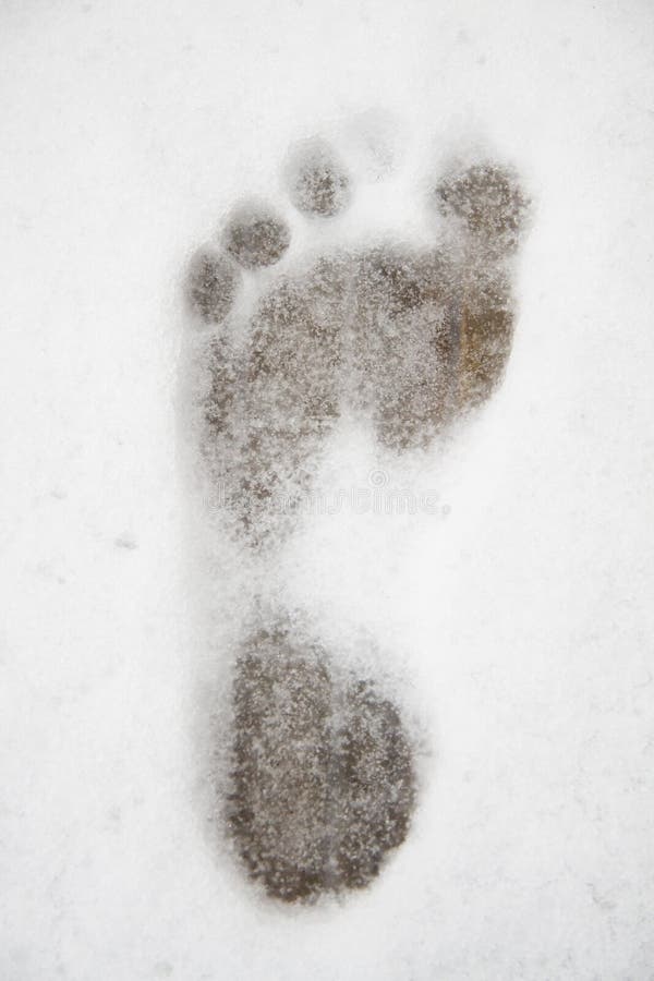 Footprint in the snow at the sauna. Footprint in the snow at the sauna