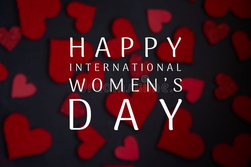 Der Tag der glücklichen Internationalen Frauentag, der mit weißem Text auf schwarzen Hintergrund mit rotem Herzen Kennzeichnung lizenzfreie stockfotos