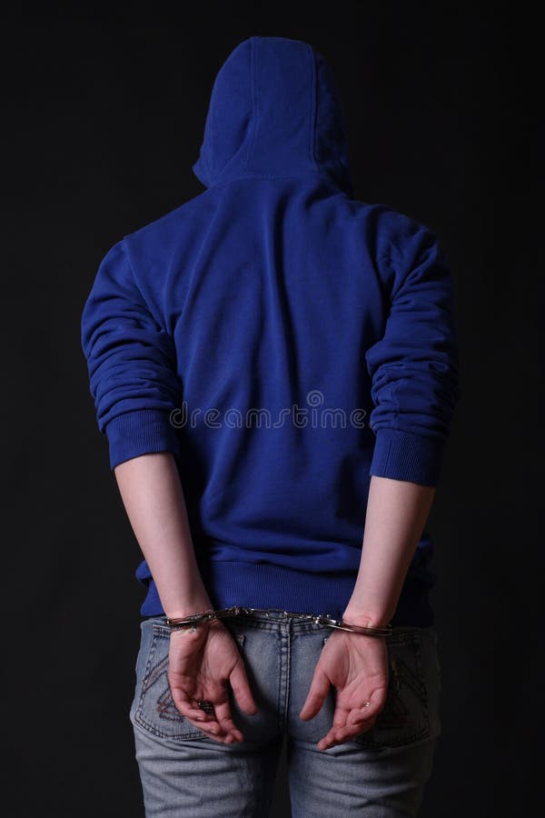 Der Übeltäter in den Handschellen stockfotos Der Übeltäter in den Handschellen stockfotos