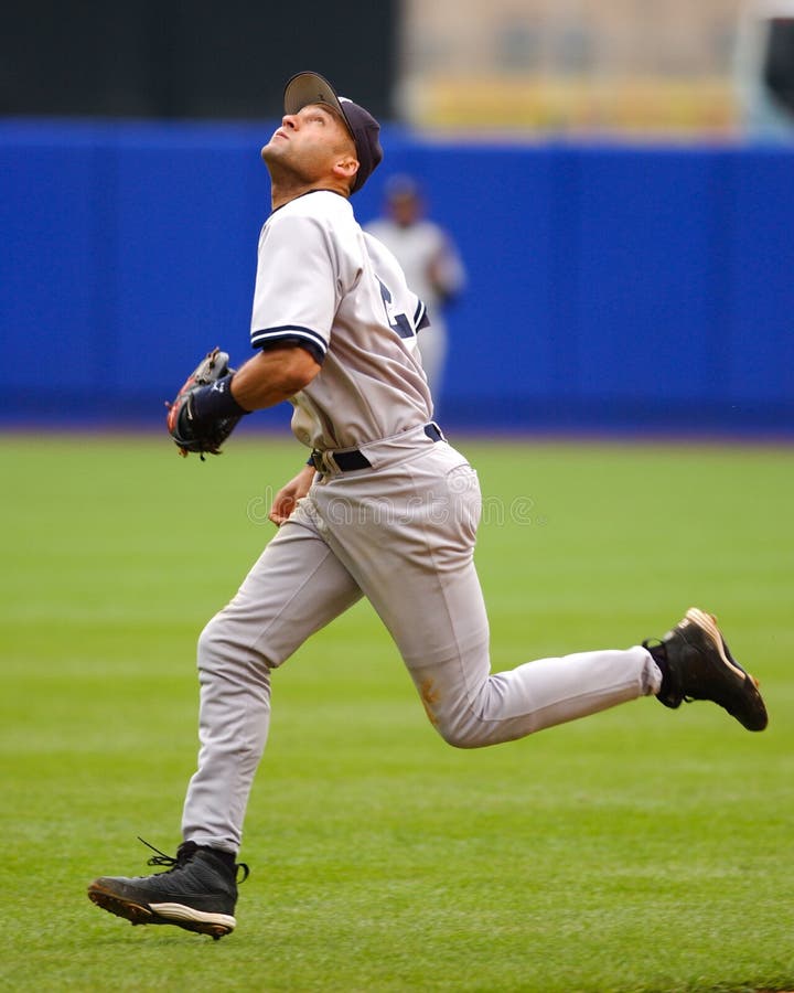 Derek Jeter chases a pop fly.