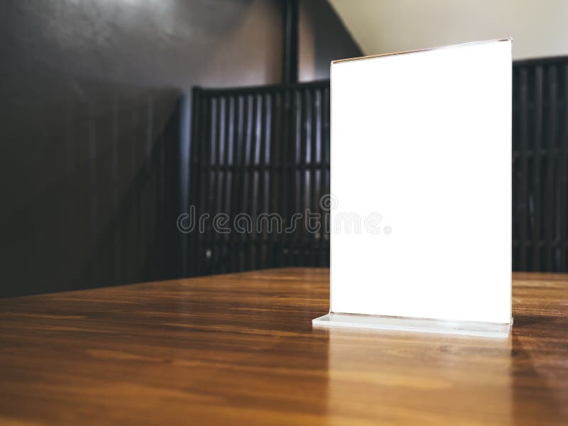 Mock up Menu frame on Table in Restaurant cafe Background. Mock up Menu frame on Table in Restaurant cafe Background