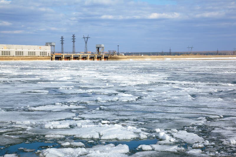 Spring floating of ice on Ob reservoir and hydropower station. Spring floating of ice on Ob reservoir and hydropower station